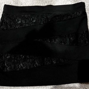 Wet Seal large black skirt with lace detail.